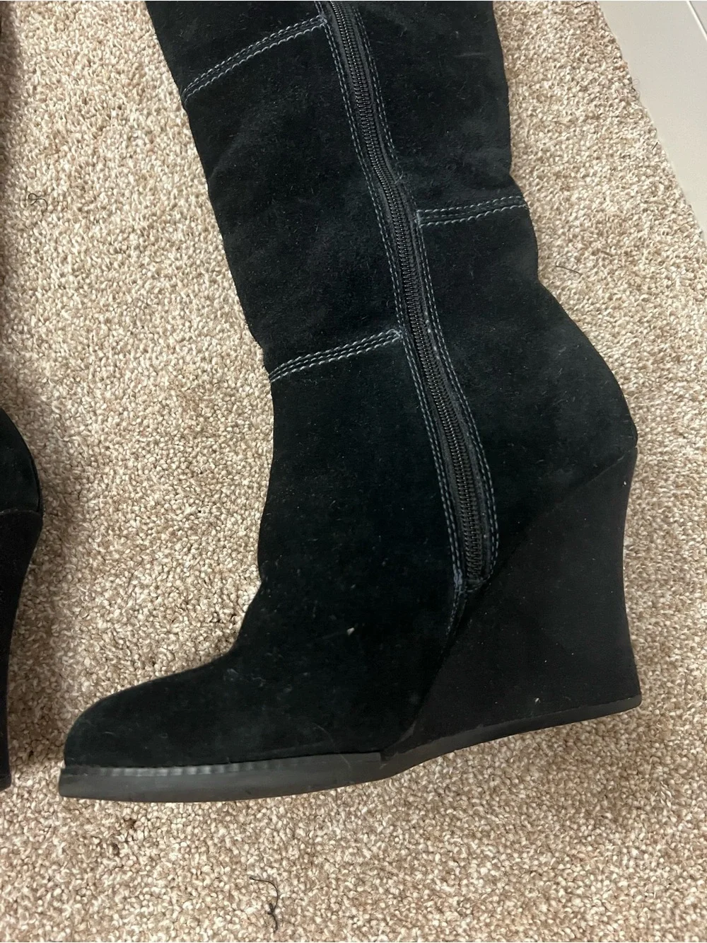 Genuine Stylish black suede knee boots with a comfortable wedge heel.
